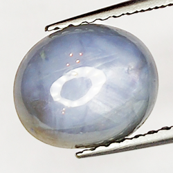 4.33ct Weiß Stern Saphir cabochon oval 9.0x7.4mm