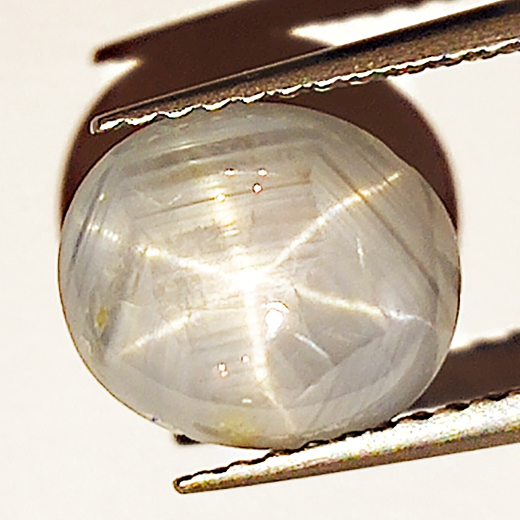 3.37ct Zaffiro Bianco Stella cabochon ovale 9.0x7.7mm