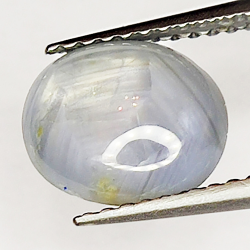 3.37ct Zaffiro Bianco Stella cabochon ovale 9.0x7.7mm