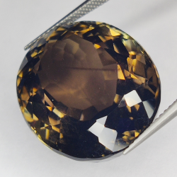 38.64ct Quarzo Fumé taglio ovale 24.0x19.6mm