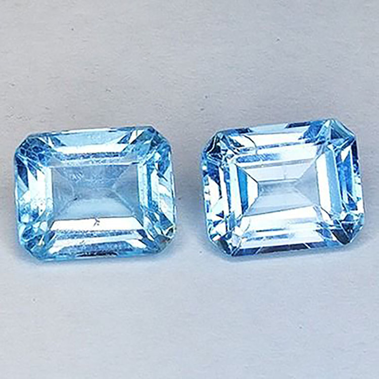 12.08ct Topacio azul talla esmeralda 11x9mm 2pz