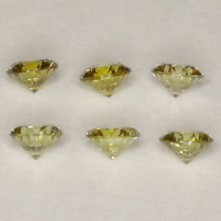 Diamante fancy verde-amarillo en talla redonda 1.7-2.3mm