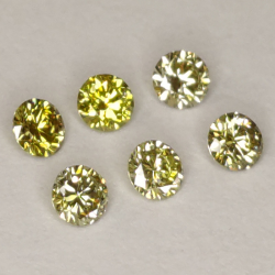 Green-yellow fancy diamond in round cut 1.7-2.3mm