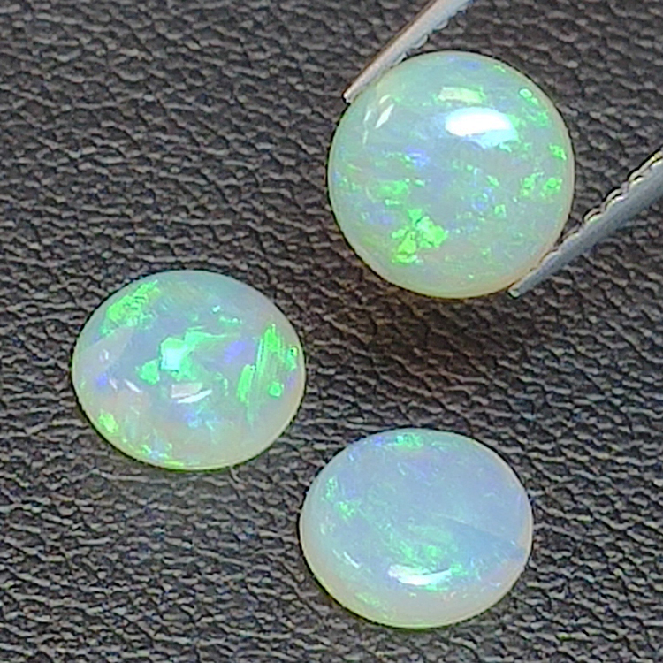 3.79ct Noble Opal cabochon Round 3pc