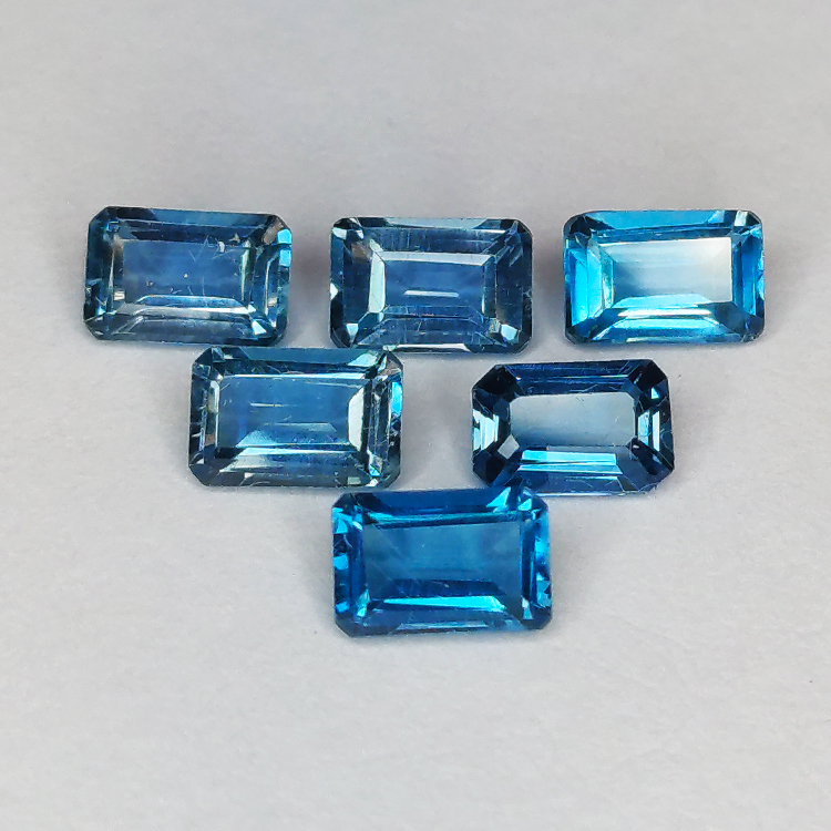 Topaz London emerald cut 6pz