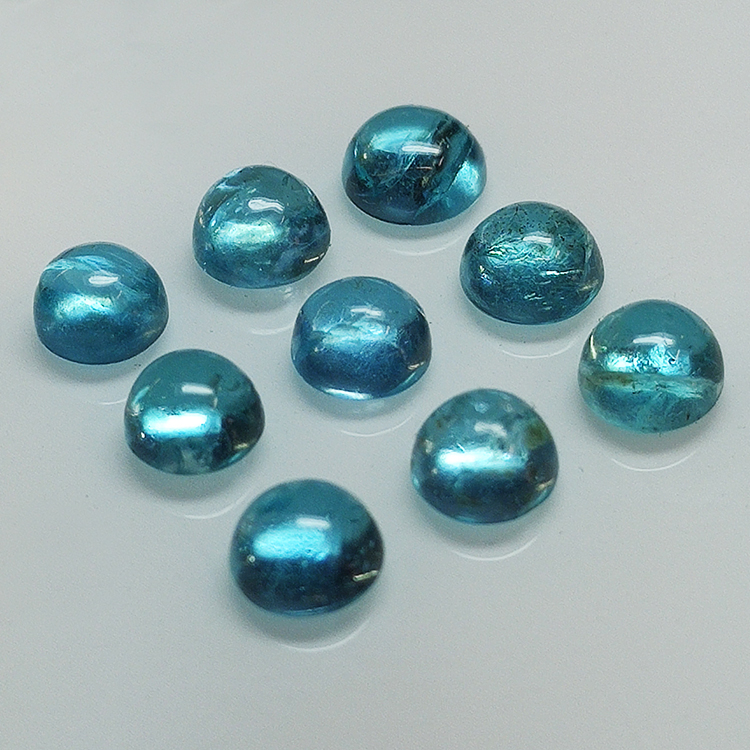 Los 7.09ct Paraiba farbiger Apatit Cabochon Schliff oval 5.50mm