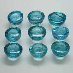 Lot 7.09ct cabochon d'apatite de couleur Paraiba coupé ovale 5.50mm