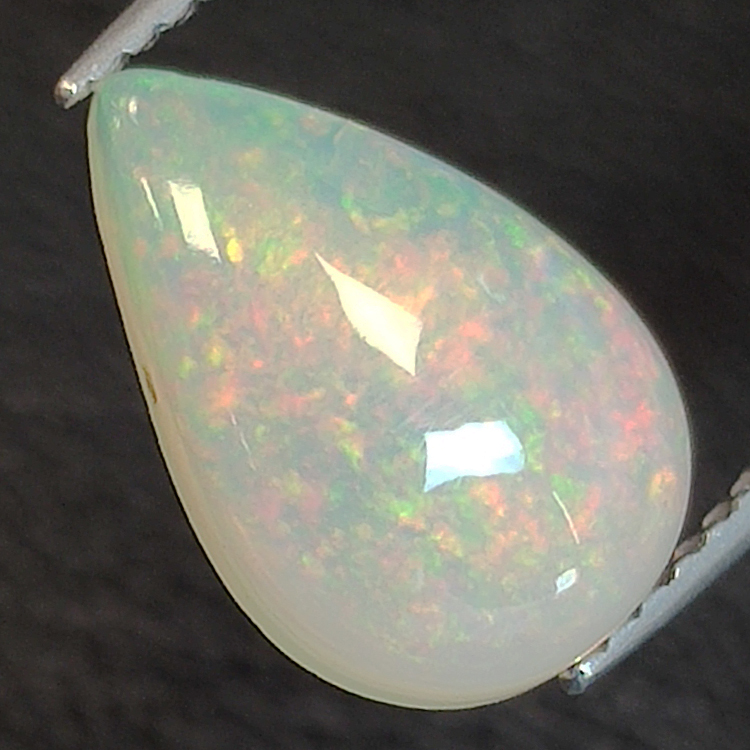 Äthiopischer (Wello) Opal im Birnenschliff 11.42 x 7.30 mm 1.59 CT