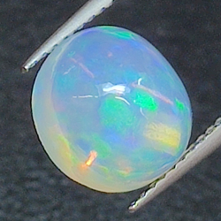 2.43ct Opal round cut 9.39 x 5.68mm