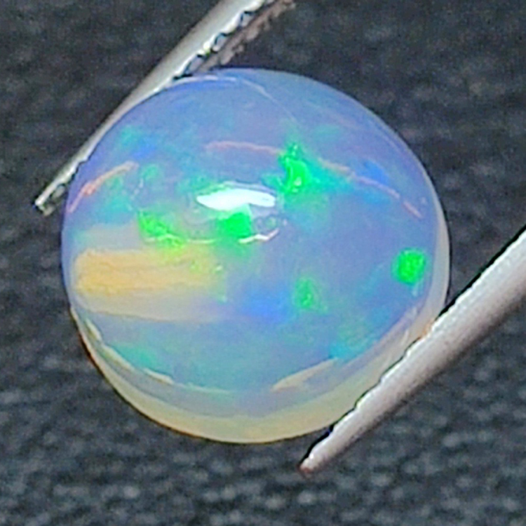 2.43ct Opal round cut 9.39 x 5.68mm