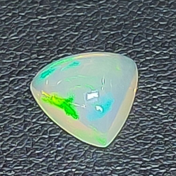 1.87 ct Trilliant cut opal 9.99 x 10.16 mm