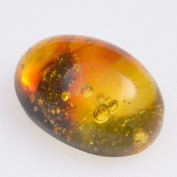 3.6ct Amber with cabochon insect