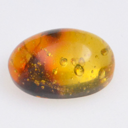 3.6ct Amber with cabochon insect