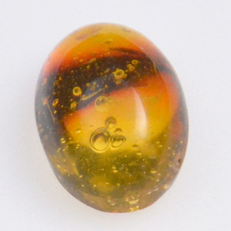 3.6ct Amber with cabochon insect