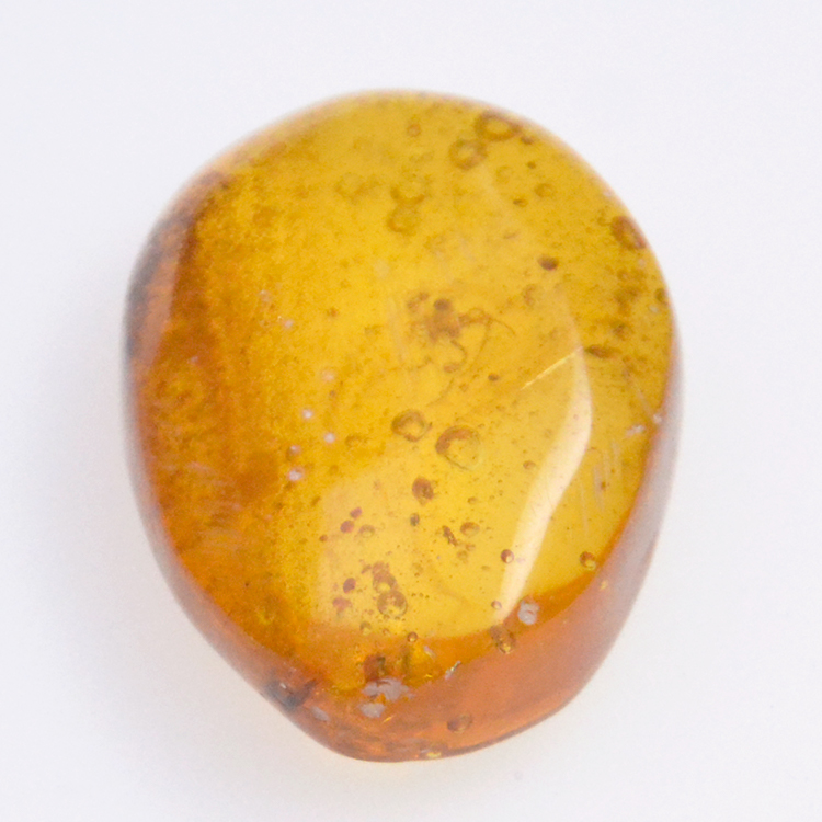 6.77ct Amber with cabochon insect