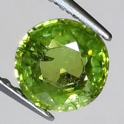 Grenat démantoïde 0,72 ct taille ronde 5,40 x 5,34 mm