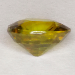 1.09ct Esfena Verde Talla Oval 6.81x6.03mm