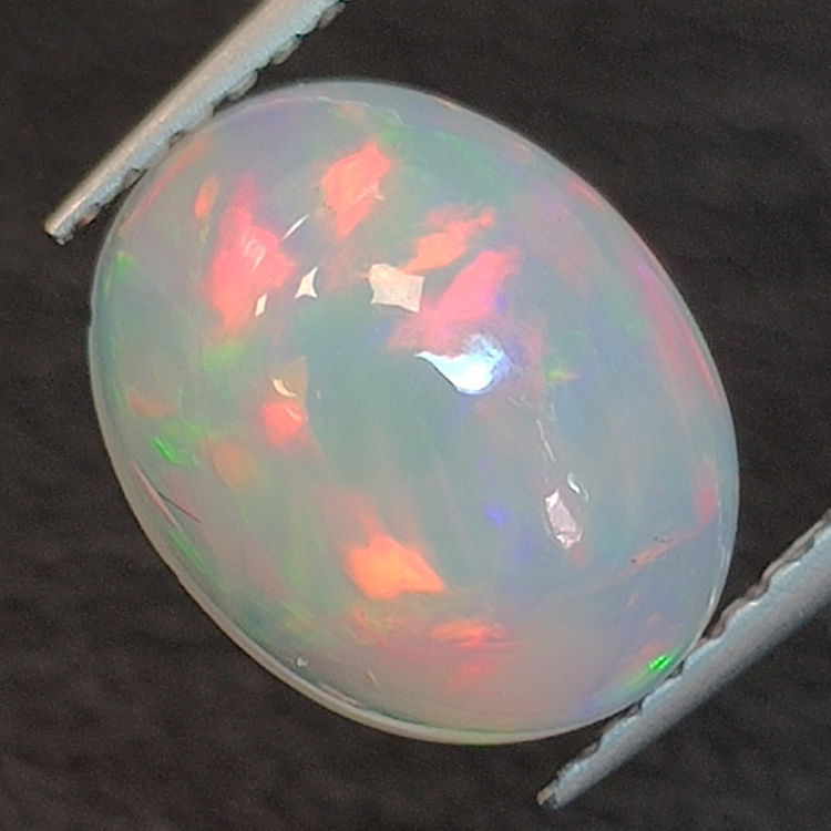 2.45ct Ópalo talla oval 10.66 x 8.25 mm
