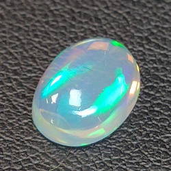 1.46ct Ópalo talla oval 10.25 x 7.49 mm