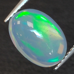 1.46ct Ópalo talla oval 10.25 x 7.49 mm