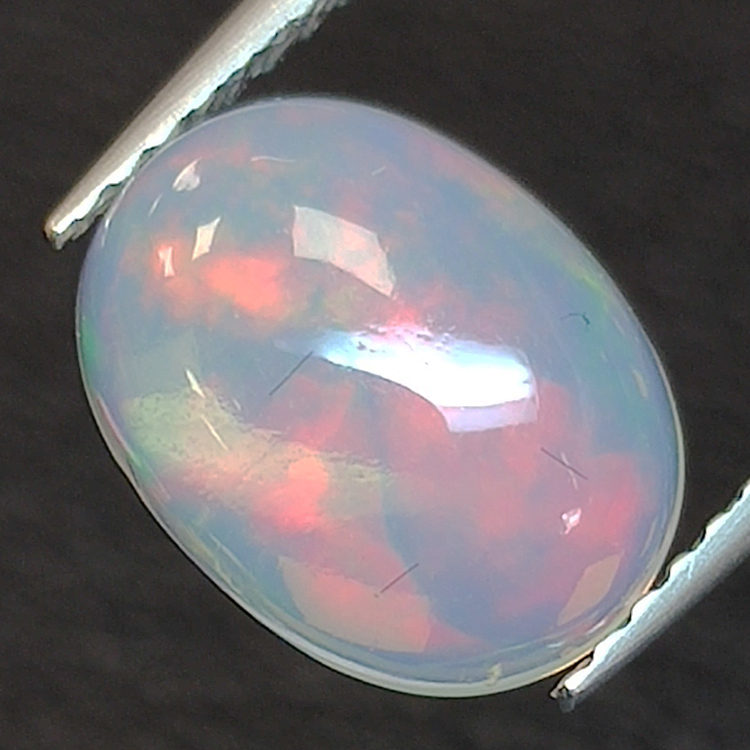 1.48ct Ópalo talla oval 10.01 x 7.54 mm