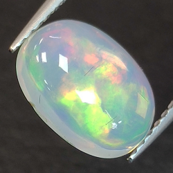 1.48ct Ópalo talla oval 10.01 x 7.54 mm