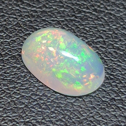 1.29ct Ópalo talla oval 9.64 x 6.75  mm