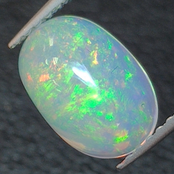 1.29ct Ópalo talla oval 9.64 x 6.75  mm