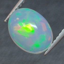 1,51ct Ópalo talla oval 9,7x7,4 mm