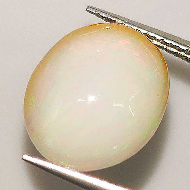 7,18 ct Opal  Oval Cabochon 15,09 x 12,83 x 7,53 mm