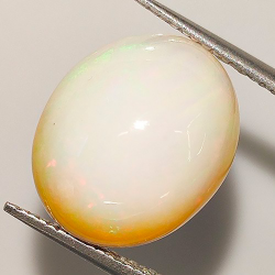 7,18 ct Opal  Oval Cabochon 15,09 x 12,83 x 7,53 mm