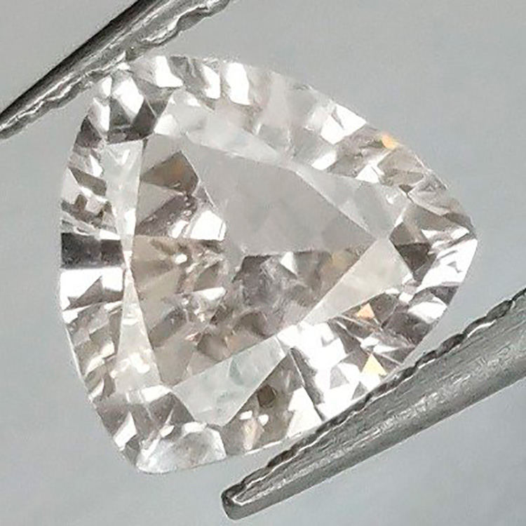 0.76 ct Padparascha Sapphire Trilliant  5.95 x 5.97 x 2.86 mm