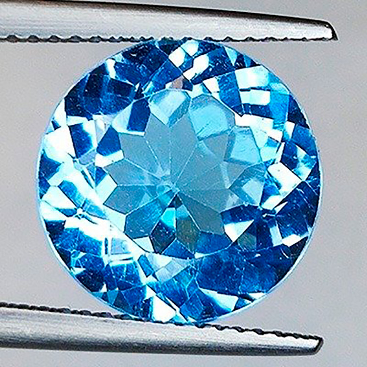 7.41 ct Topaz Blue round 12 x 7 mm