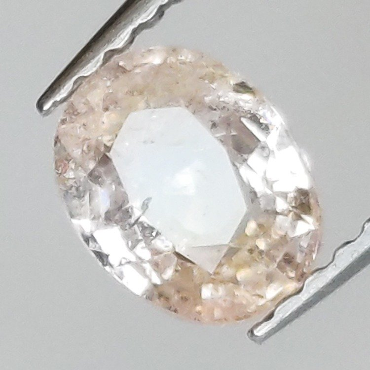 0,97 ct oval-cut padparadscha sapphire 6,57 x 5,20 x 3,13 mm