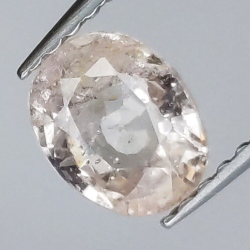0,97 ct Zafiro Padparadscha talla oval 6,57 x 5,20 x 3,13 mm