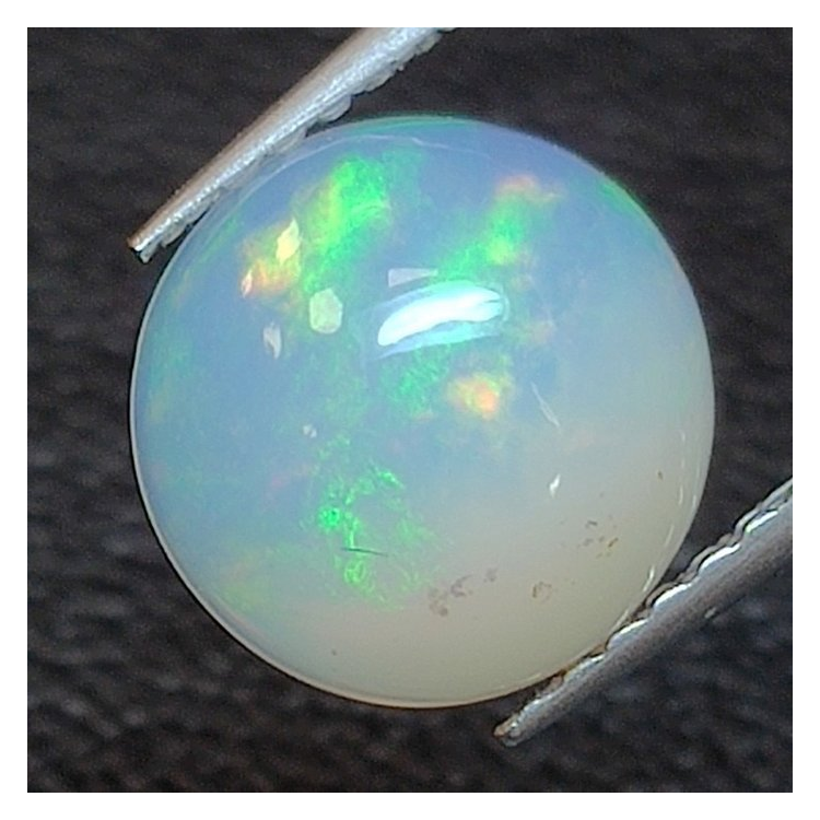 1,47 ct Round cut waved opal 8,42 x 8,56 x 4,18 mm