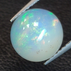 1,47 ct Opal im Rundschliff gewellt 8,42 x 8,56 x 4,18 mm