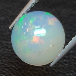 1,47 ct Opale ondulata taglio rotondo 8,42 x 8,56 x 4,18 mm