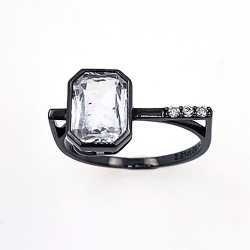 18KT black gold ring with sapphire and diamond.