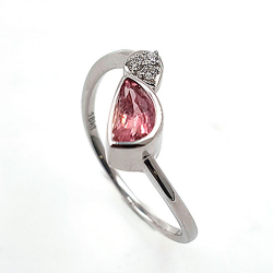 Padparadscha sapphire and diamond 18KT white gold ring.