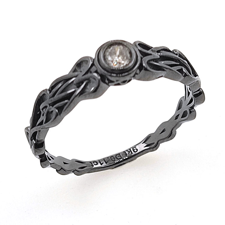 Anillo de Diamante en oro amarillo  de 9 kt con baño de rodio negro en nudo celta
