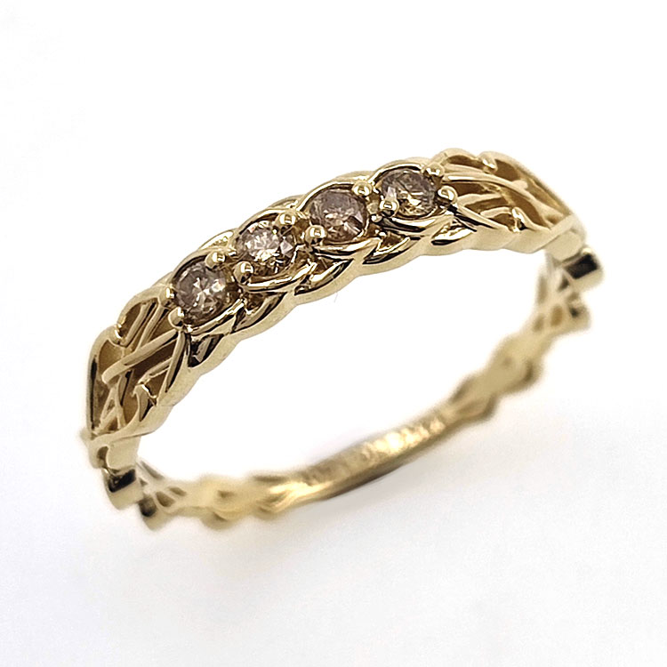 Anello con diamante e nodo celtico in oro giallo 14 carati